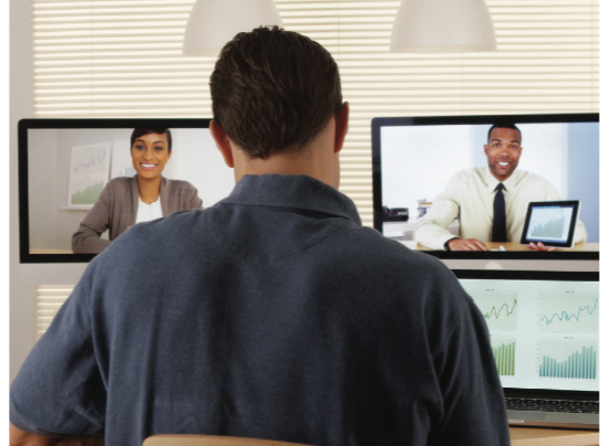 Man Looking at Computer Screens