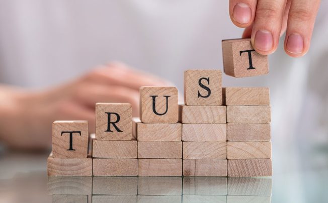 trust written in building blocks